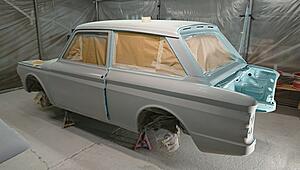 Click image for larger version  Name:	Lhs doors in primer.JPG Views:	0 Size:	2.04 MB ID:	719